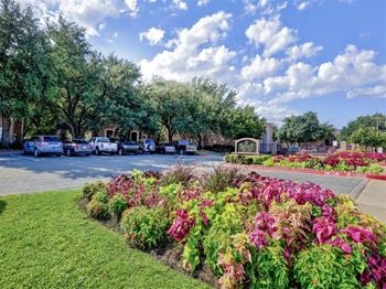 Open parking with carports and detached garages