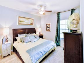Irving apartment for rent - Bedroom with cozy bed at Mission at La Villita Apartments, Irving