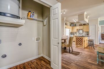 Frisco apartment for rent - an open door leading into a kitchen and a living room