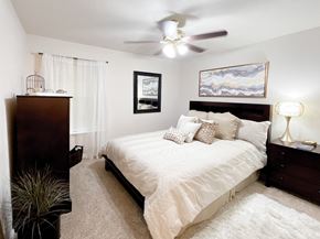 Tulsa apartment for rent - Interior bedroom with white walls and ceiling fan at Greenbriar Apartments, Tulsa, 74136