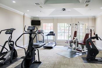 24/7 Fitness center with cardio & strength training equipment