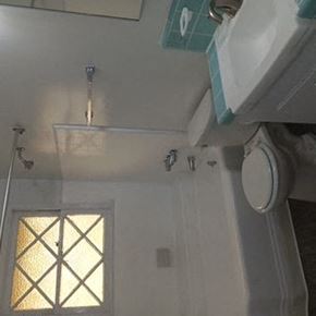 Valley Village apartment for rent - A bathroom with a shower and a window.