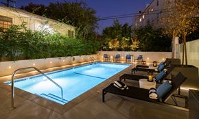 Los Angeles apartment for rent - a swimming pool at night at the ace hotel
