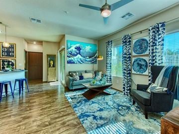 Mesa apartment for rent - a living room with a couch and a table