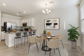Mesa townhouse for rent - Dining area and kitchen with room for bar top seating at Casa Sole Vita Townhomes, Mesa, AZ