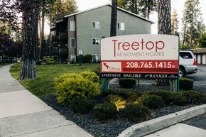 Coeur D'alene apartment for rent - a sign in front of an apartment building