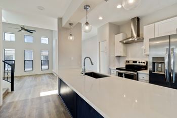 White cabinetry throughout the kitchen