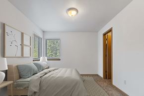 Coeur D’Alene apartment for rent - a bedroom with a bed and a window