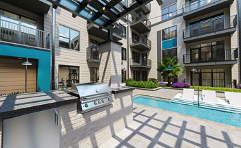 Image of pool with lap lane and gas grills 