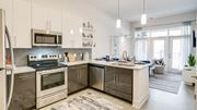 Atlanta apartment for rent - Kitchen attached to living room at Link Apartments® Grant Park, Atlanta, GA