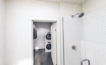 Smart home washer/dryer in new studio floor plan