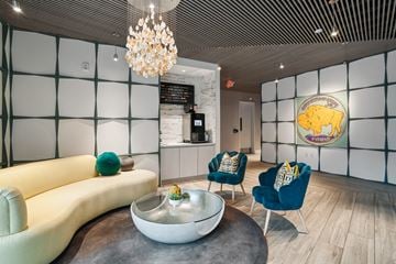 Charlotte apartment for rent - a living room with a couch and chairs and a coffee table
