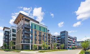 Charlotte apartment for rent - a new apartment building with a street in front of it