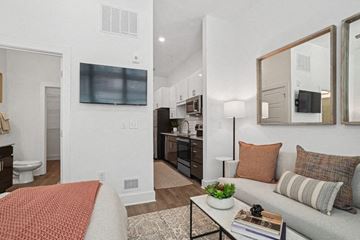 Charlotte apartment for rent - a living room with a couch and a table