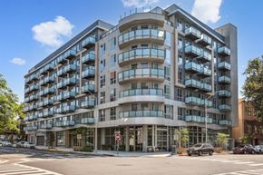 Oakland apartment for rent - an apartment building on the corner of a city street at Link Apartments® Four 12, Oakland, CA