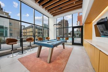 A room with a pool table