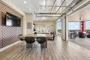 Greenville apartment for rent - Rooftop lounge with outdoor terrace and dining at Link ® West End Apartments, Greenville, South Carolina