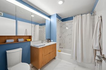 A bathroom with a white toilet