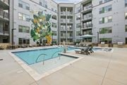 Smyrna apartment for rent - Courtyard pool with mural and lounge chairs at Link ® Lake Park Apartments, Smyrna, Georgia