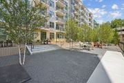 Smyrna apartment for rent - Outdoor courtyard with gravel seating area at Link ® Lake Park Apartments, Smyrna