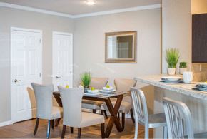 Loveland apartment for rent - a dining room with a table and chairs
