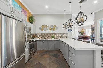 Vacaville apartment for rent - the kitchen has stainless steel appliances and a large white counter top