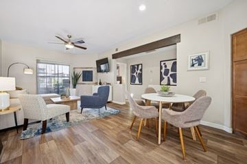 Scottsdale apartment for rent - A living room with a white table and chairs.