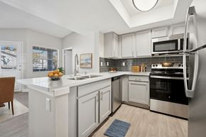Las Vegas apartment for rent - A modern kitchen with a skylight above the island.
