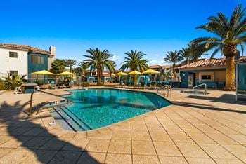 Heated resort-style pool with sundeck and spa