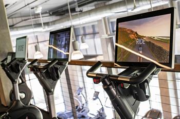 24-Hour indoor/outdoor fitness center with free weights, cable machines, and cardio machines