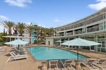 Relaxing resort-style pool with sundeck and spa
