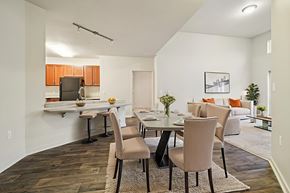 Redmond apartment for rent - A modern dining room with a table set for four.