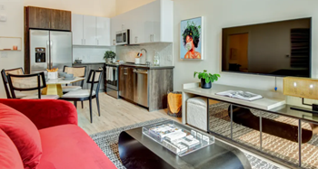 Stainless steel appliances including built-in microwave, refrigerator, and dishwasher