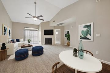 Tempe apartment for rent - the preserve at ballantyne commons living room with couches and a table