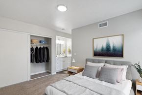Upland apartment for rent - a bedroom with a bed and a closet
