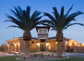 Sacramento apartment for rent - a building with palm trees in front of it
