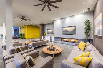 Resident social lounge with full kitchen, media room, and gaming tables