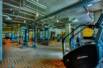 State-of-the-art fitness center with yoga, spin, and cross-fit rooms