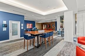 Seattle apartment for rent - A dining area with a table surrounded by chairs.