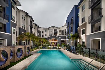 Relaxing resort-style pool with sundeck and spa