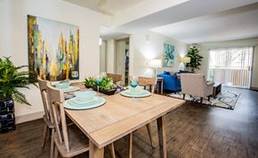 Las Vegas apartment for rent - A dining room with a wooden table and chairs.