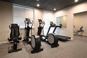 Portland apartment for rent - A gym with elliptical machines and a treadmill.