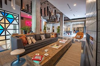 Resident social lounge with demonstration kitchen and media area
