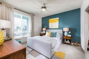 Chula Vista apartment for rent - bedroom with white bed and large window