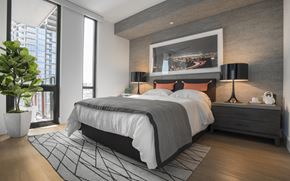 San Diego apartment for rent - a bedroom with a bed and a painting on the wall