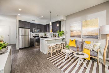 Stainless steel appliances including built-in microwave, refrigerator, and dishwasher