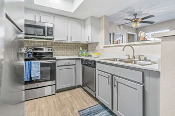 Fully equipped kitchen with custom cabinetry
