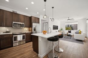 Phoenix apartment for rent - a kitchen and living room with a large white counter top