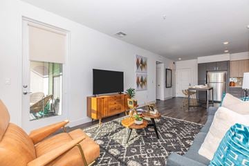San Jose apartment for rent - a living room with a couch and a tv