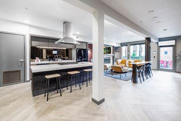Portland apartment for rent - a large kitchen and dining area with a table and chairs